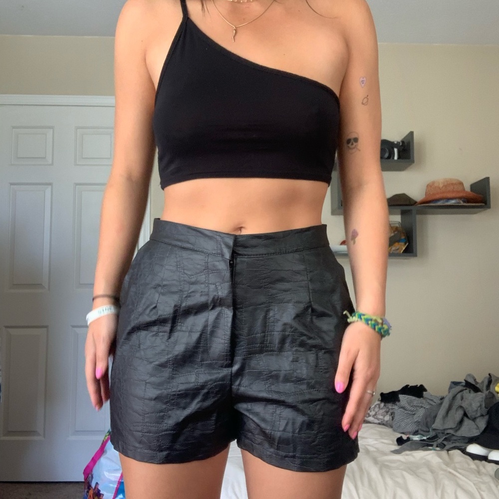 Black leather crocodile shorts